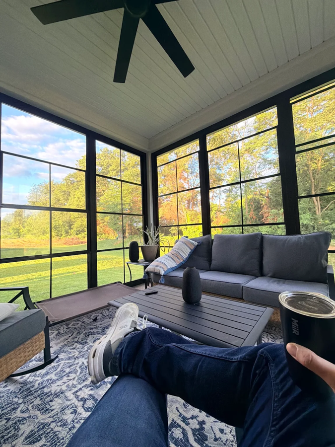 Custom screened porch with outdoor seating